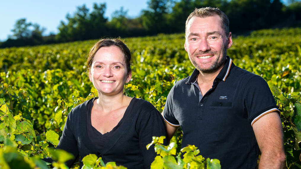 A portrait of siblings Anaïs and Julien Barraud amongst the vines.
